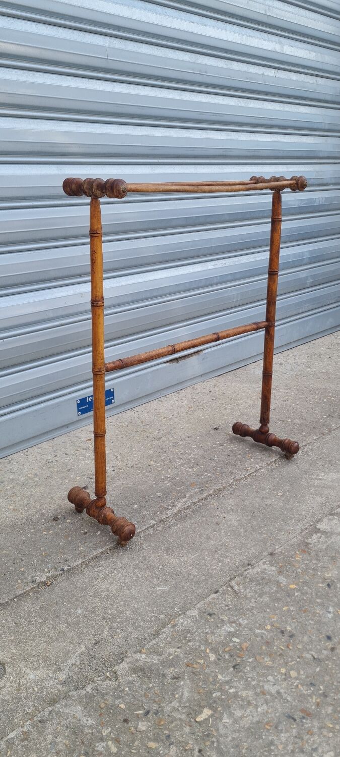 Turned wooden towel rack