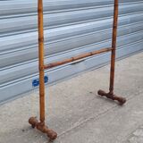Turned wooden towel rack
