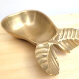 Pear-shaped pocket emptier in gilded brass