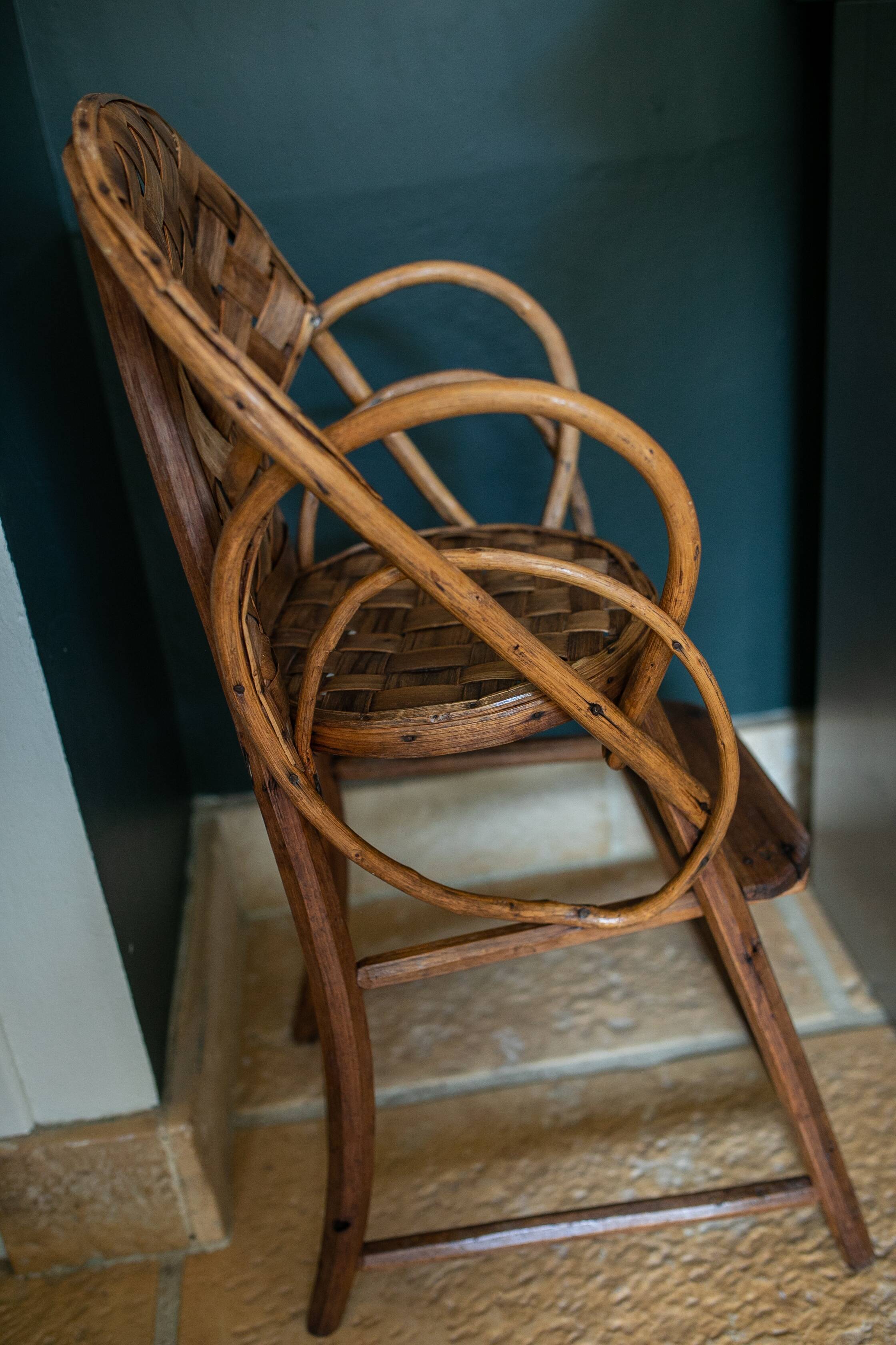 Chaise haute en rotin