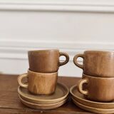 4 stoneware coffee cups and saucers