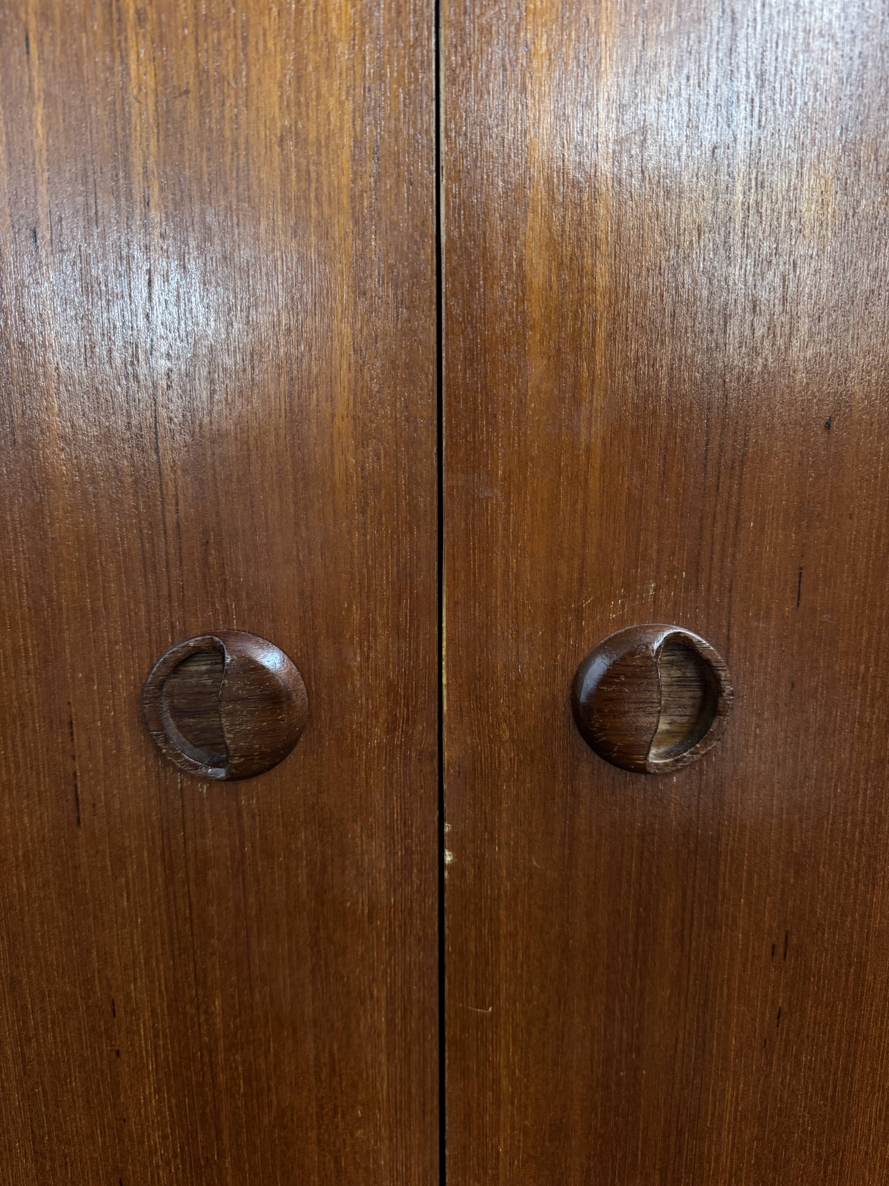 Teak 2-door wardrobe — hanging space + shelves — 1960s/70s