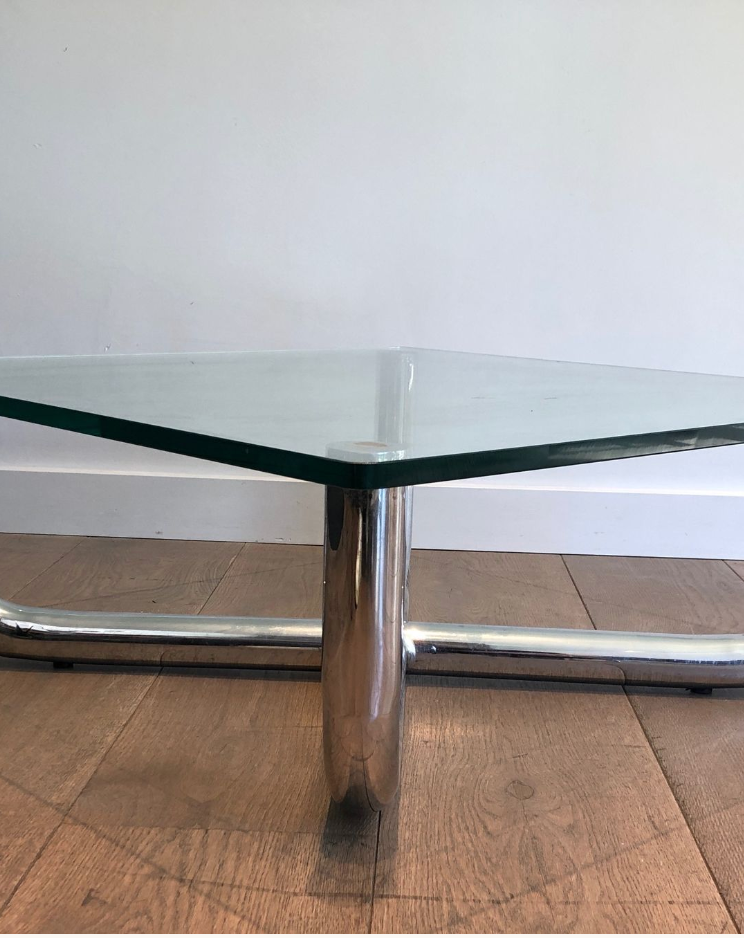 Chrome coffee table with a glass top