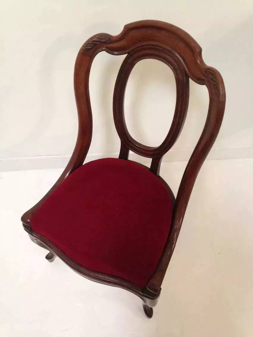 Antique empire style gondola chair