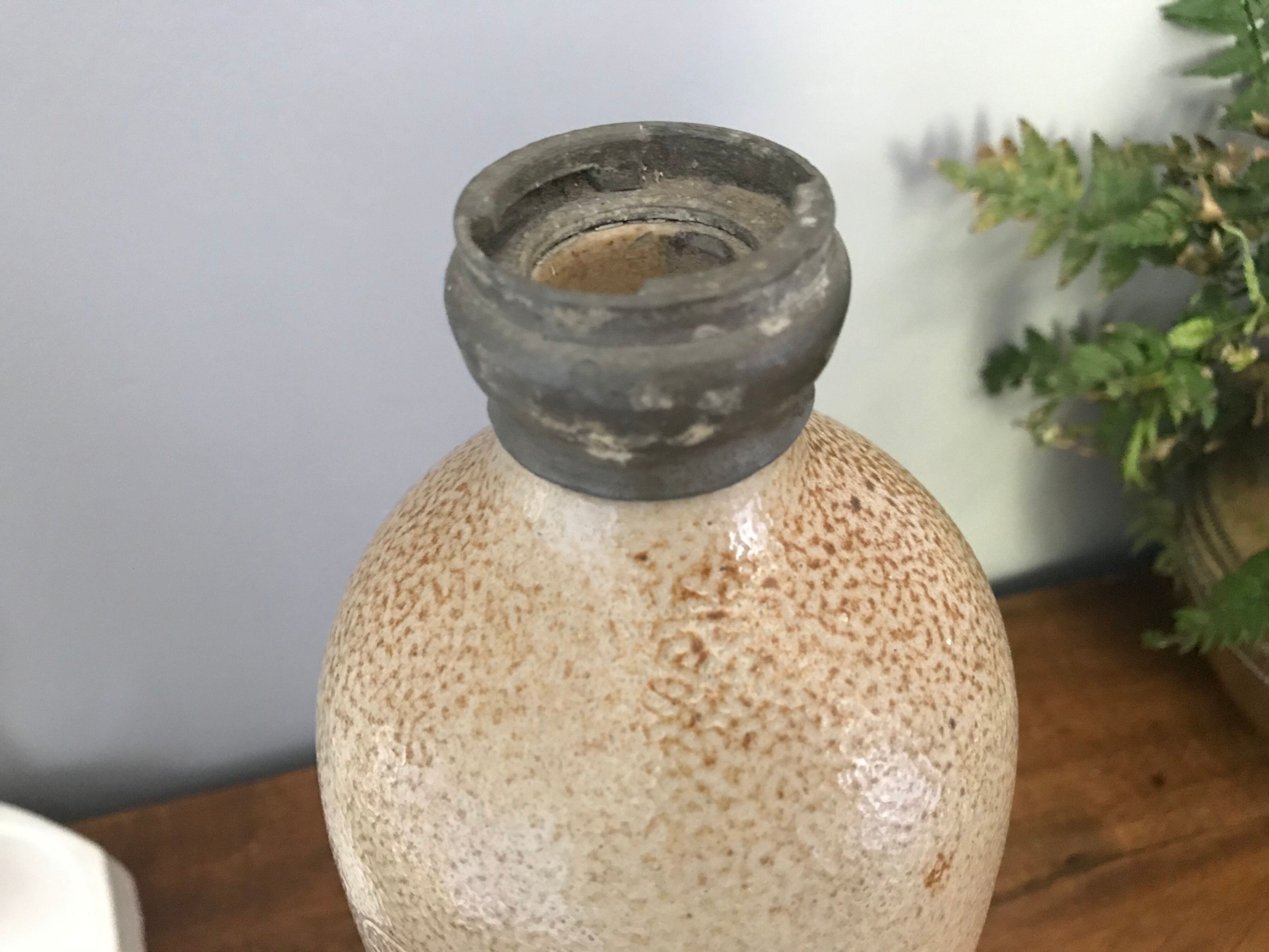 Old sandstone bottle