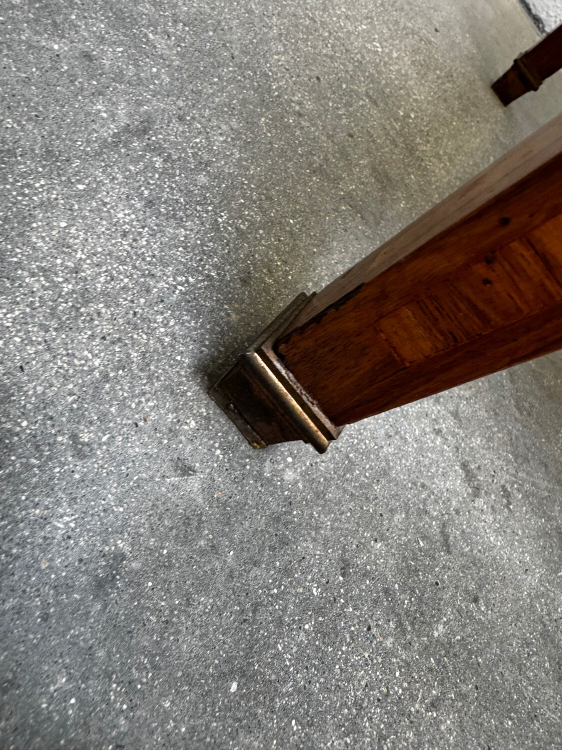 Cylinder desk with marquetry featuring a crosshatch design.