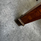 Cylinder desk with marquetry featuring a crosshatch design.