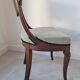 Pair of mahogany gondola chairs – Empire style – 20th century, restored