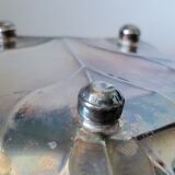 Old empty cut pocket in silver metal art nouveau in the shape of a sheet