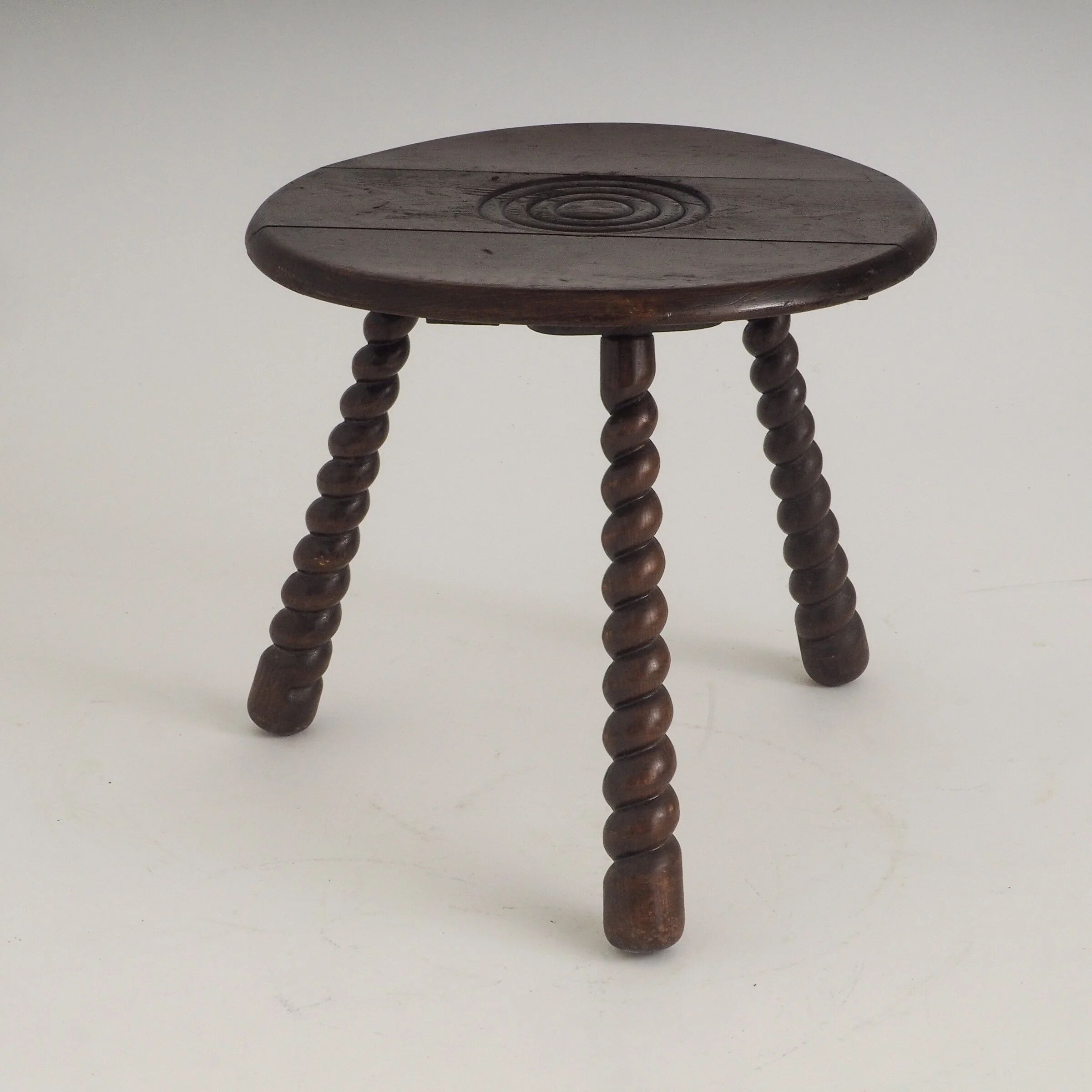 French oak tripod side table attributed to Charles Dudouyt
