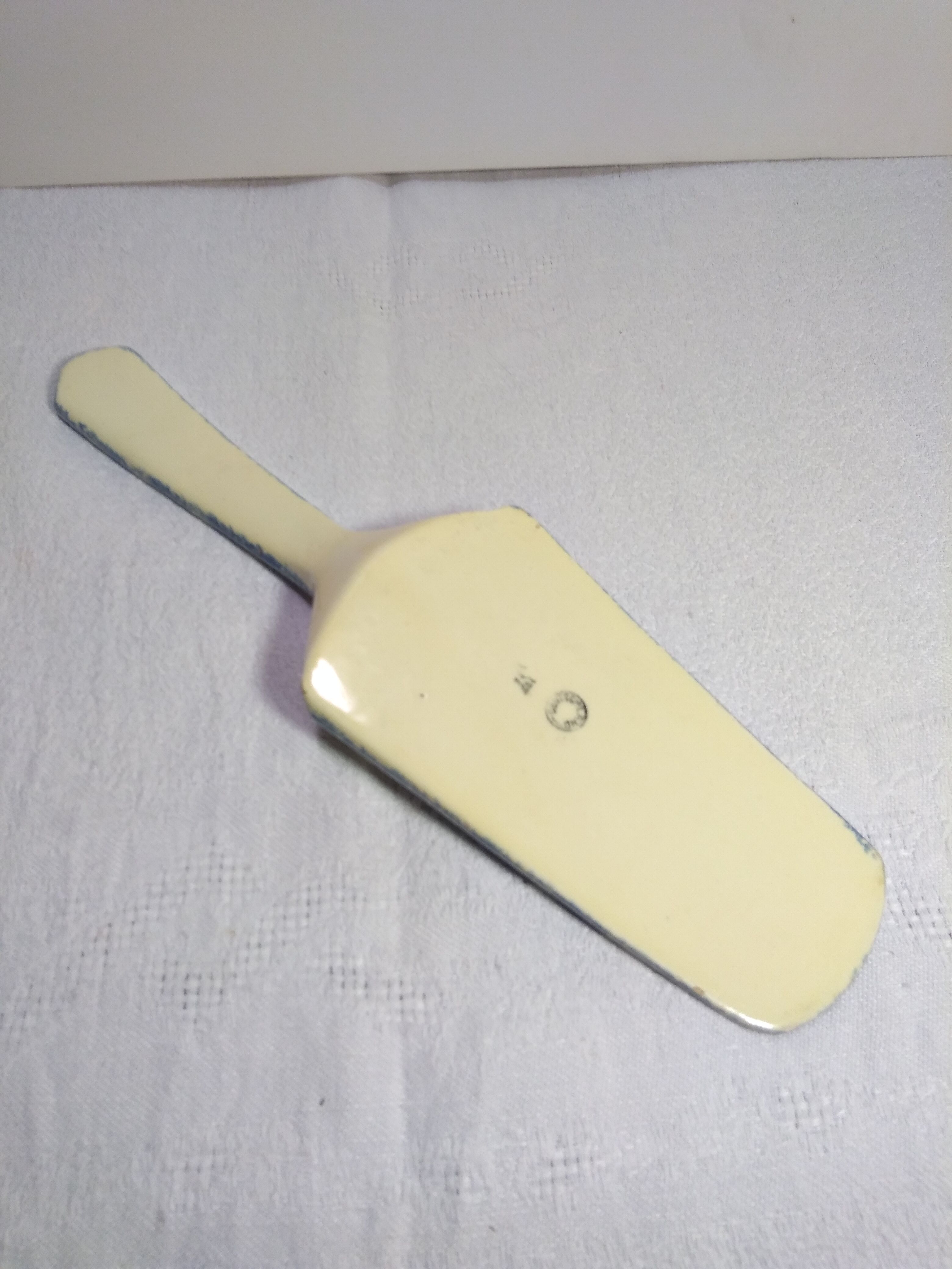 Vintage earthenware pie shovel