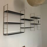 Vintage wall shelves in gold and black metal