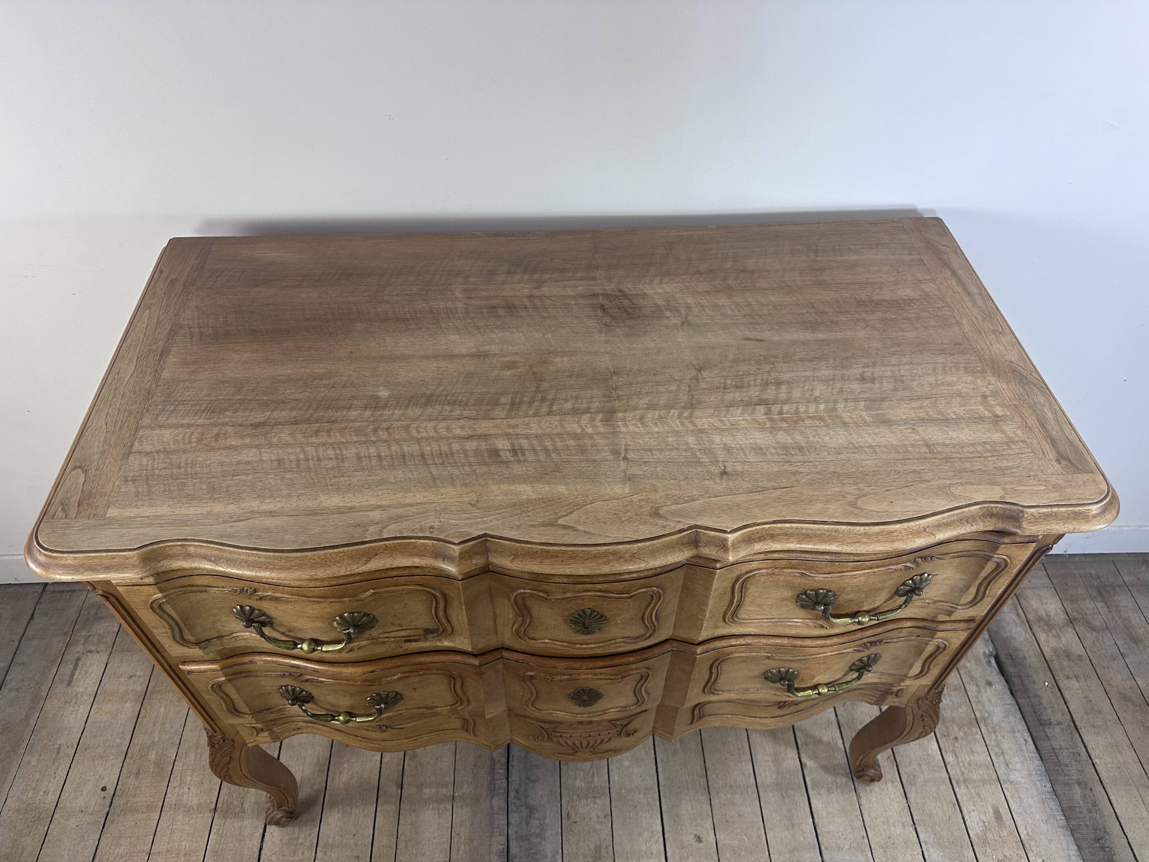 Louis XV style chest of drawers in carved wood