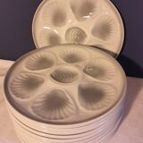 Suite of 12 oyster plates