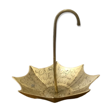 Brass pocket emptier