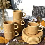Series of 6 sandstone cups and saucers