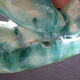 Empty-pocket small basket of green ceramic water in the style of woven basket