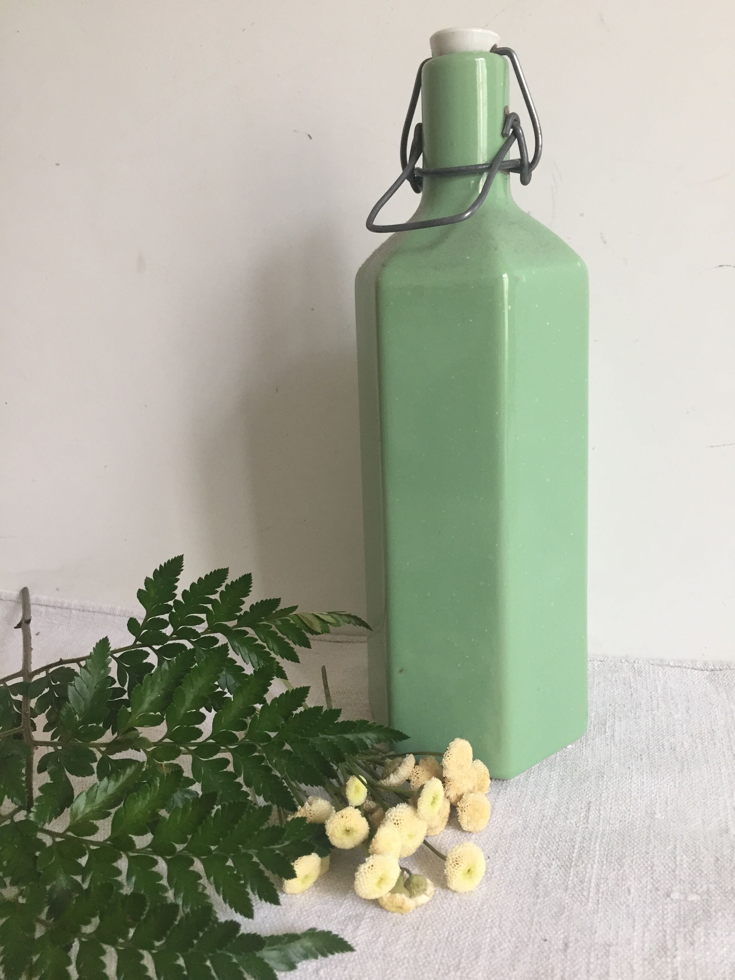 Green hexagonal sandstone bottle
