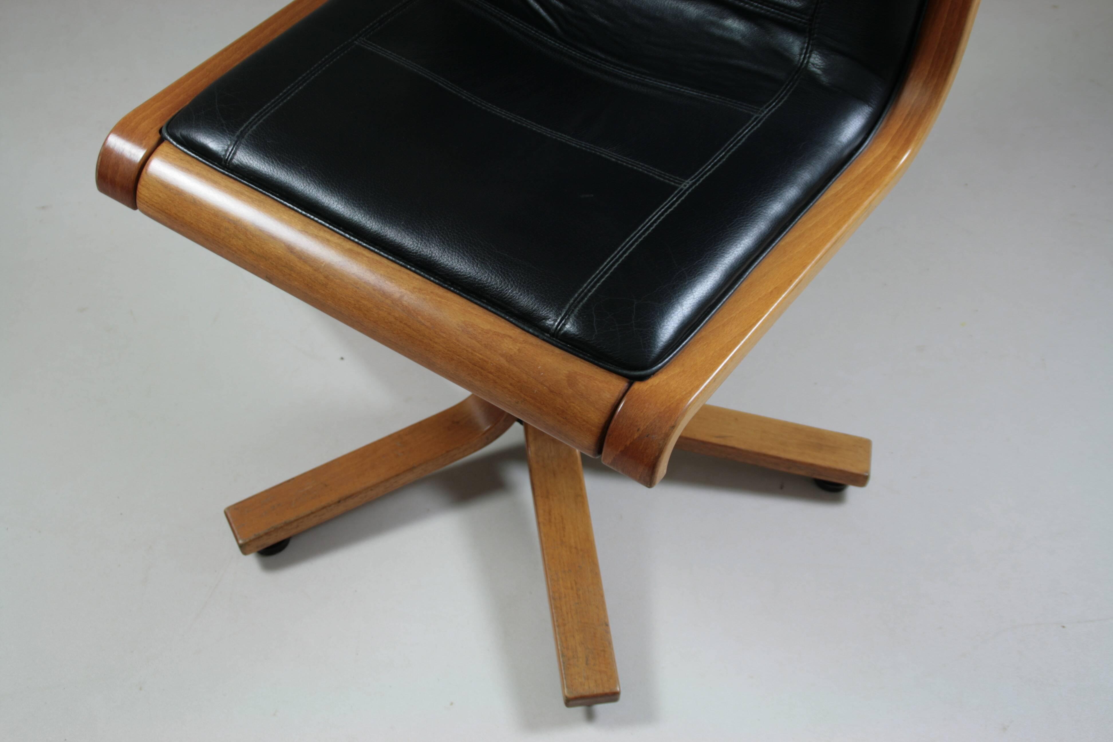Office armchair in beech and black leather for Cofemo, Italy