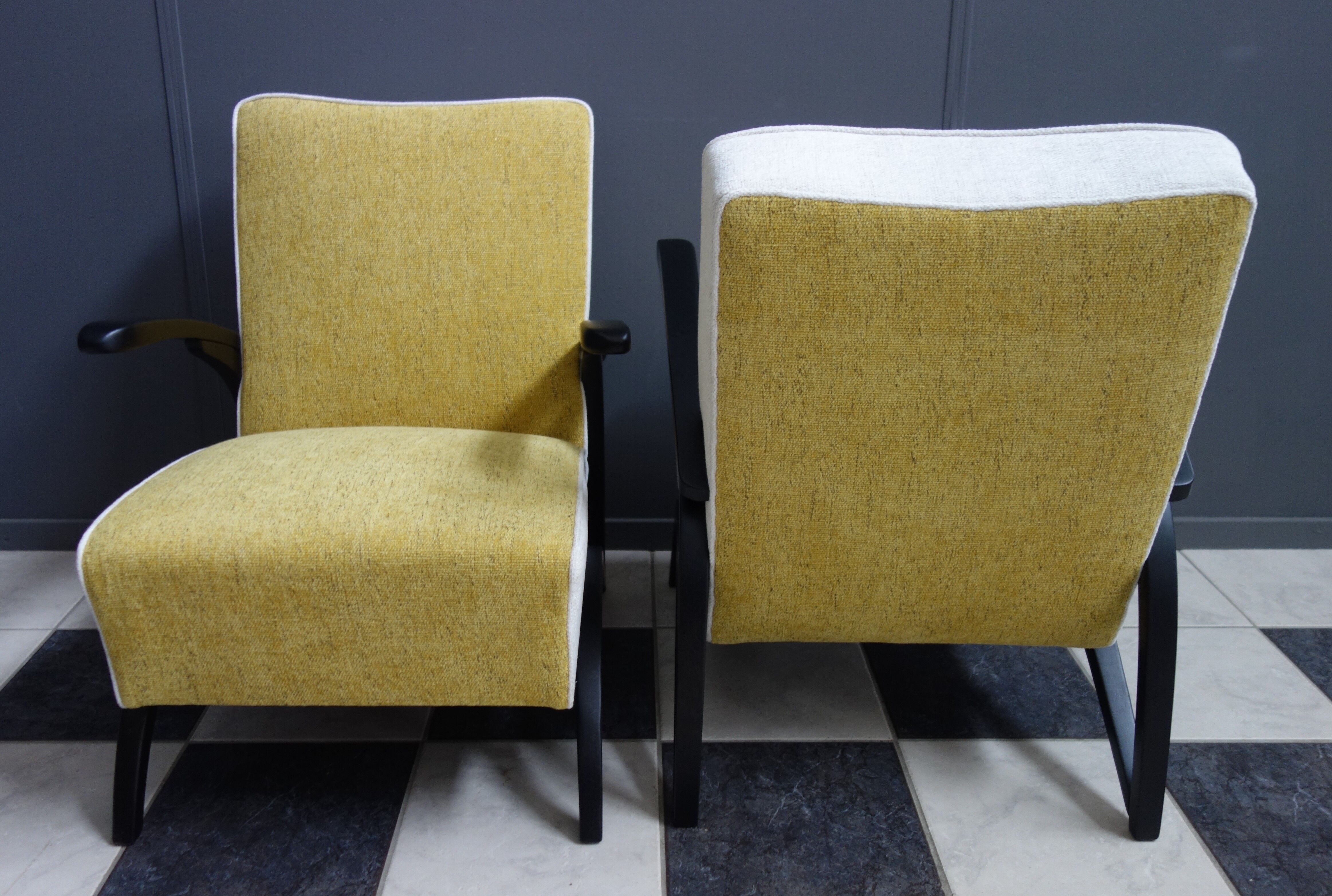 Jindrich halabala chairs yellow and white