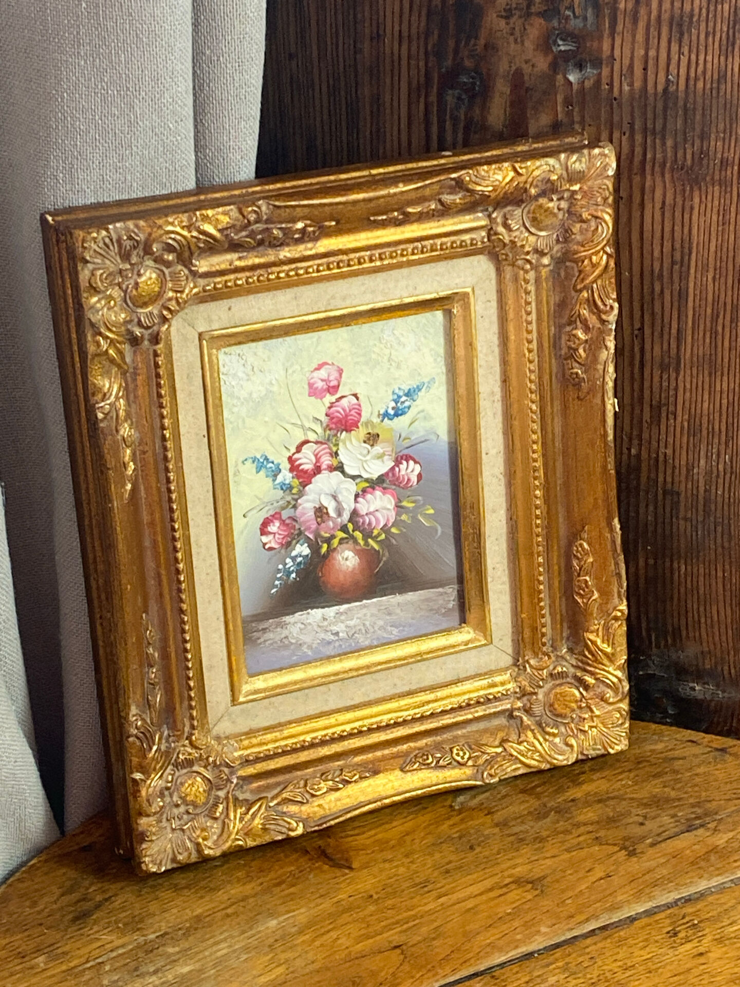 Still life, painting on hardboard, wooden and stucco frame.