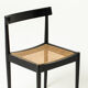 Mid-century dining chair in black laquered wood and cane