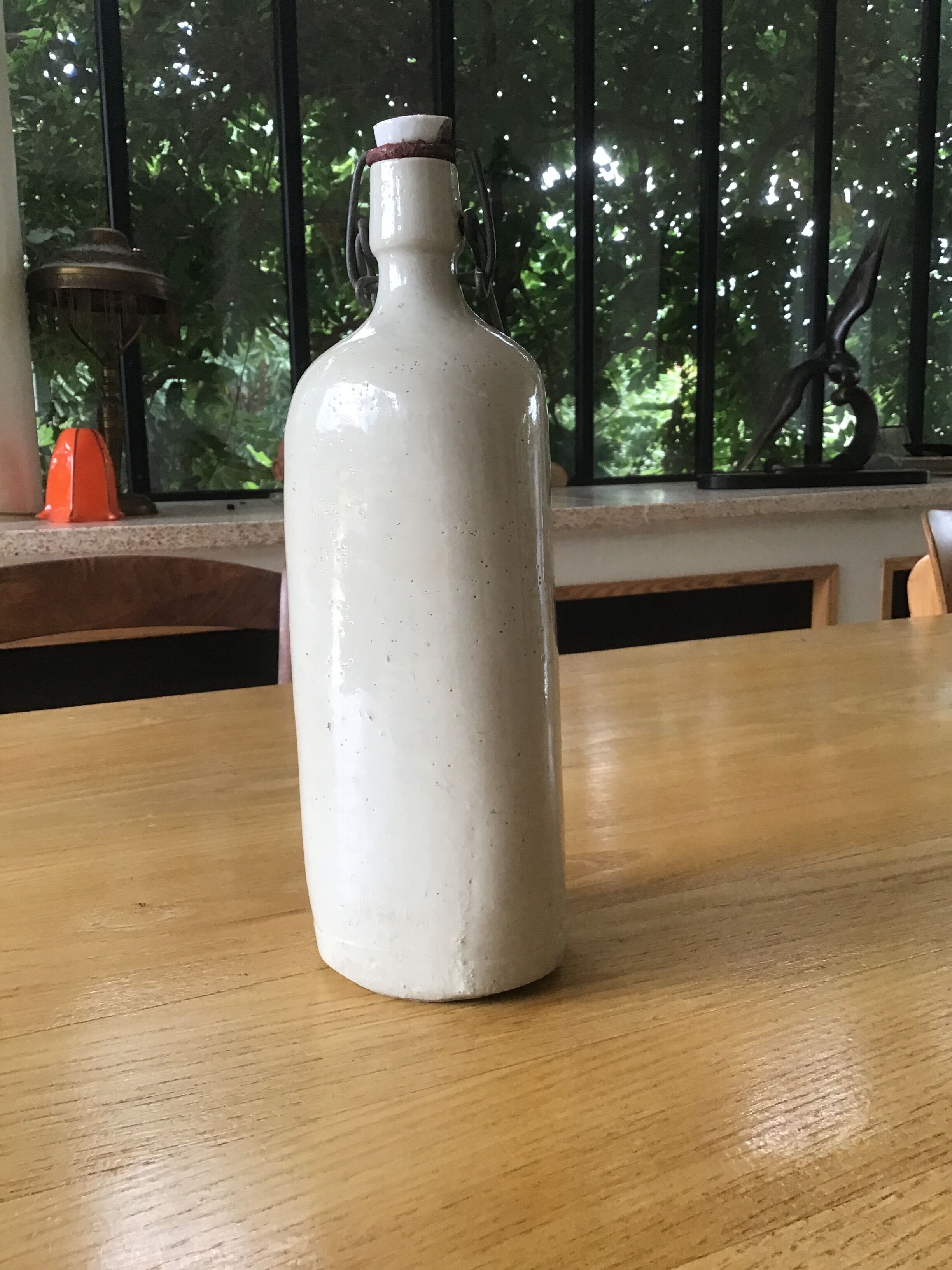 Triangle shaped sandstone bottle
