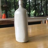 Bouteille en grès forme triangle