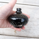 Ink bottle 1900 in black glass