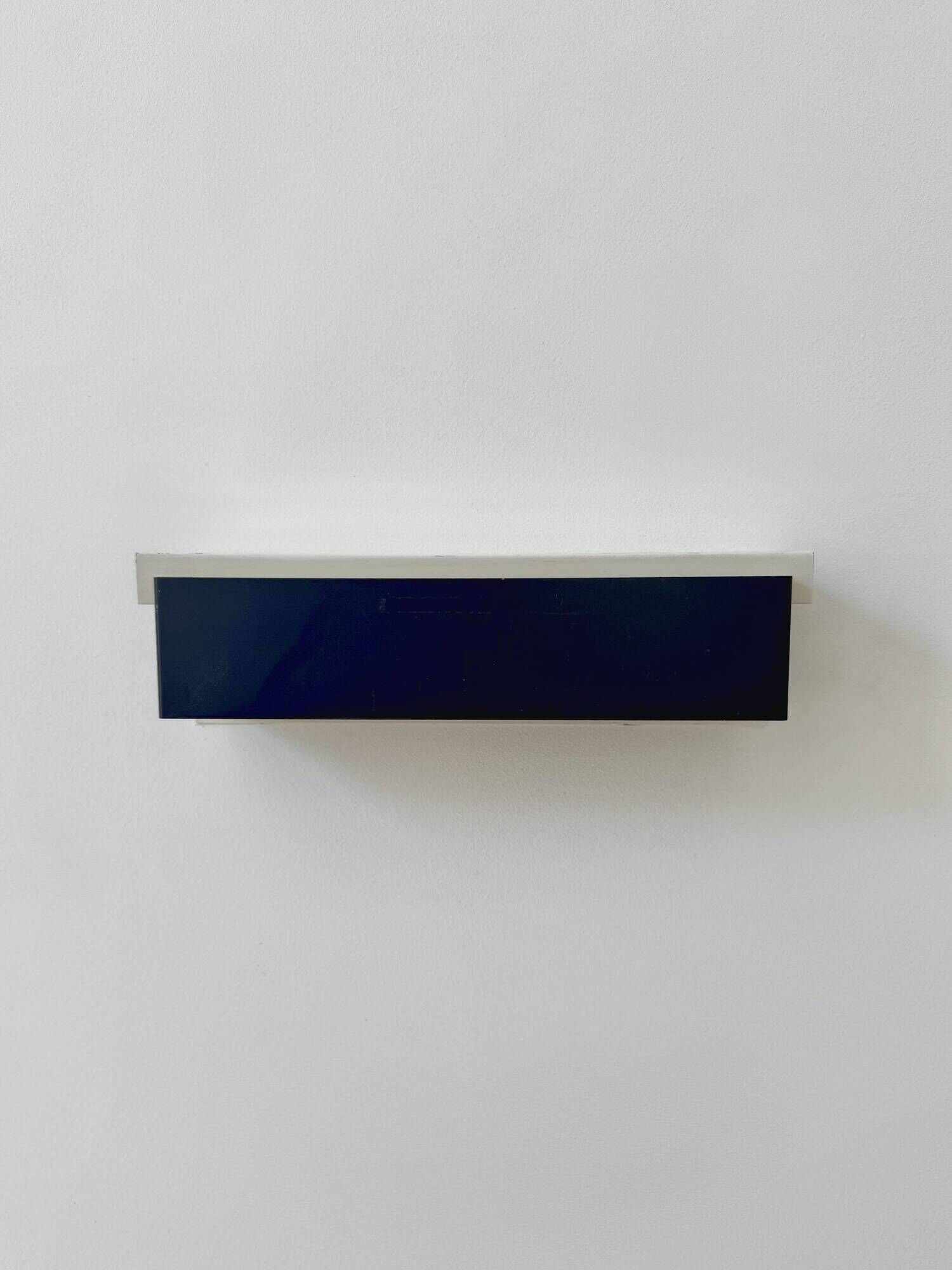 Pair of vintage wall sconces, painted black and white metal, Sweden 1970.
