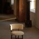 A modern Danish elegant low-back chair, reupholstered in lambswool, 1940s.