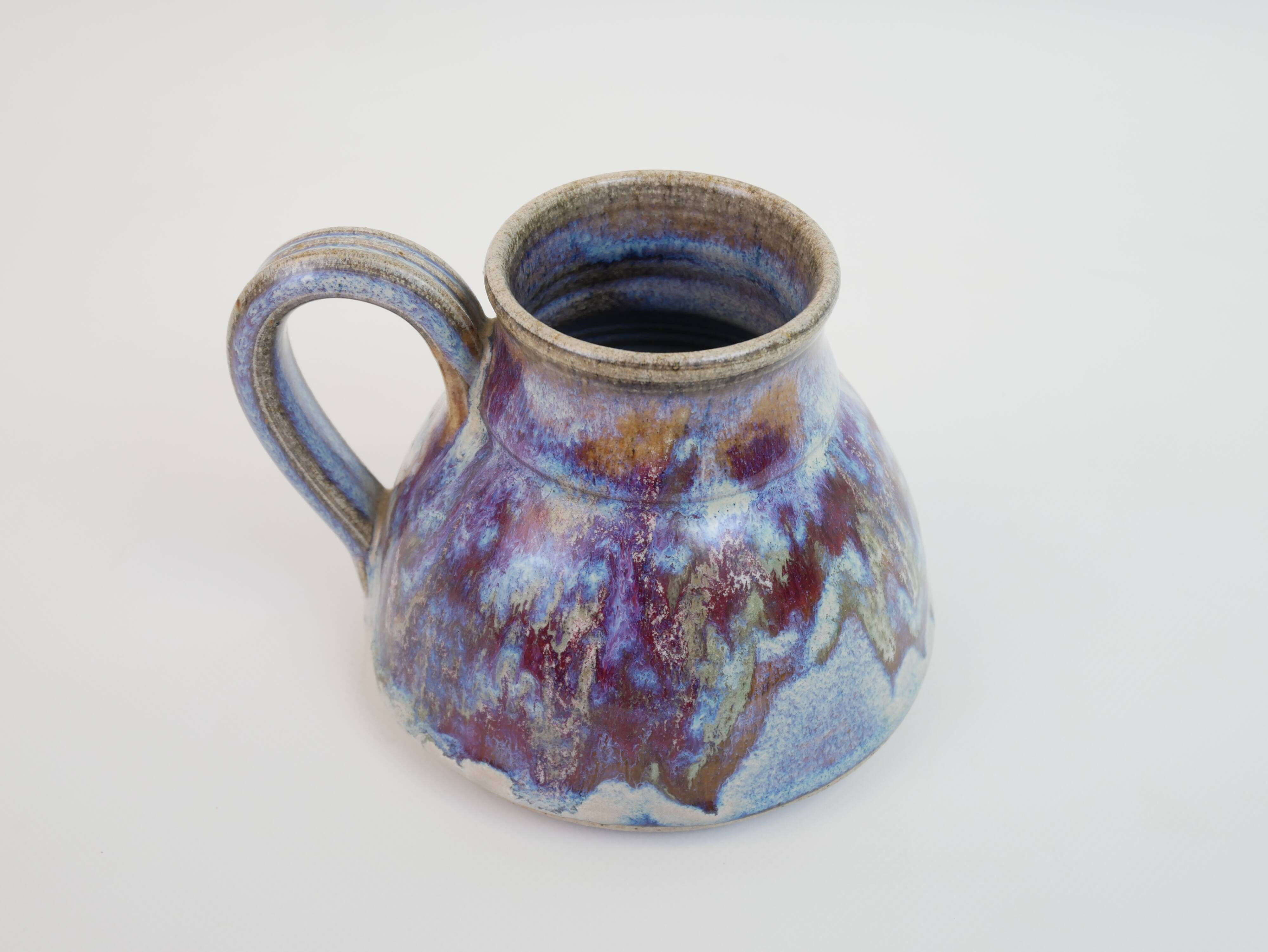 signed blue purple enamel ceramic pitcher