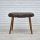 1960s, reupholstered Danish armchair, with stool, genuine sheepskin.