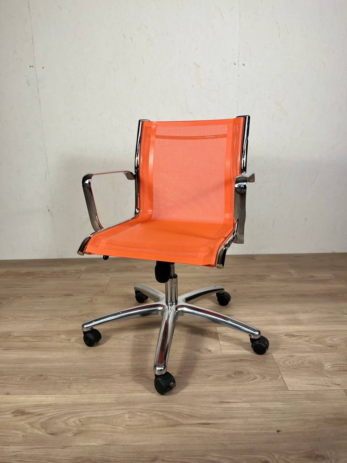 Designer office chair - Orange mesh and chrome base