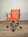 Chaise de bureau design - Résille orange et piètement chromé