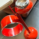 Red magazine ashtray on stand from the 70s