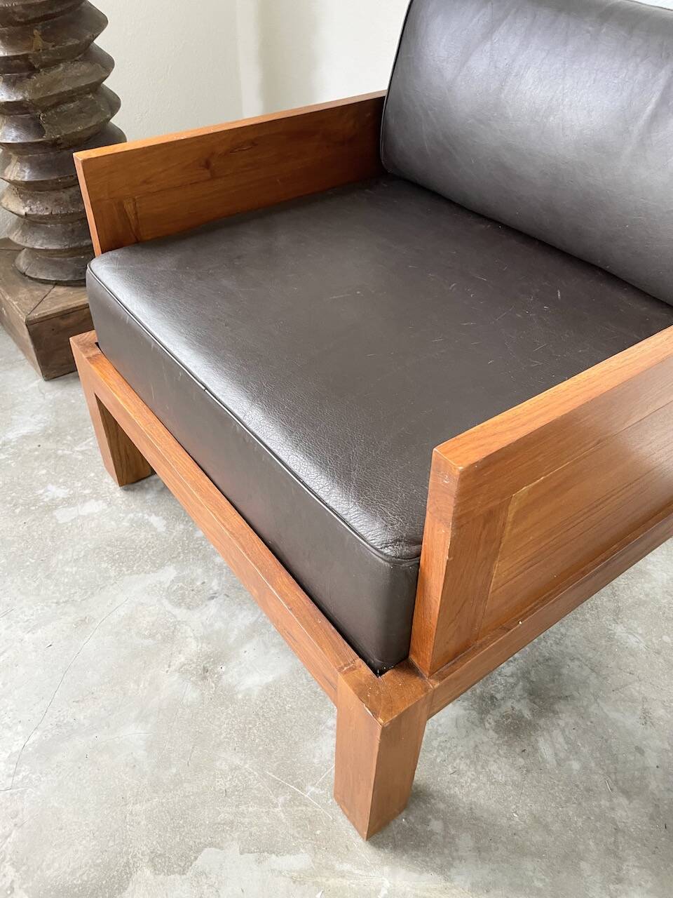 Modernist armchair in exotic wood and leather
