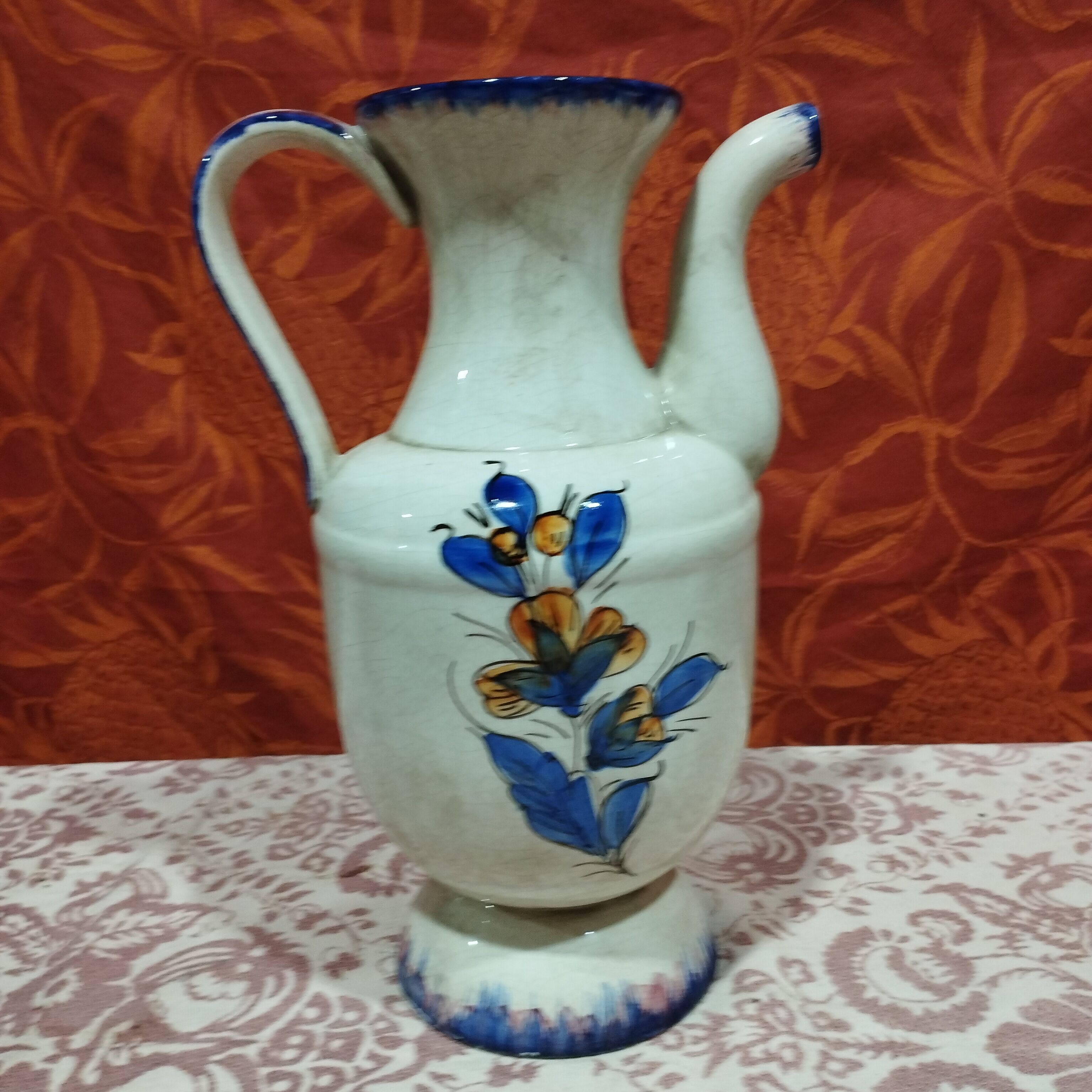 Hand-painted cracked ceramic pitcher