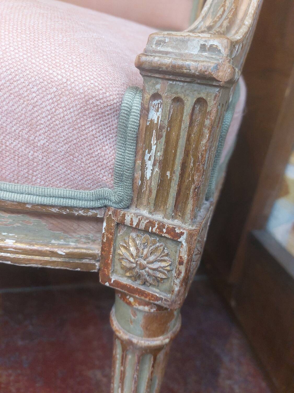 Patinated Louis XVI style armchair