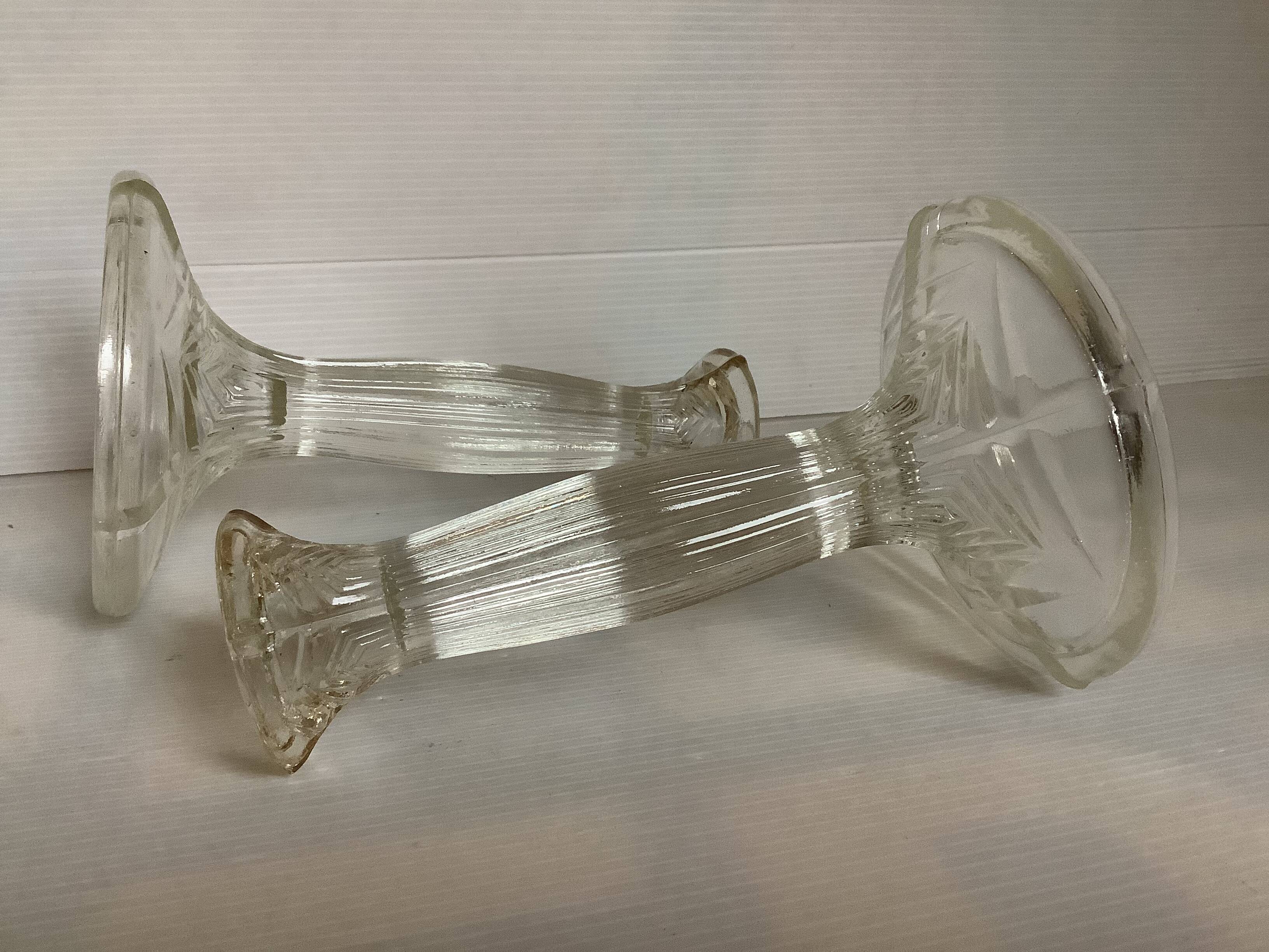 Pair of geometric art deco molded glass candlesticks