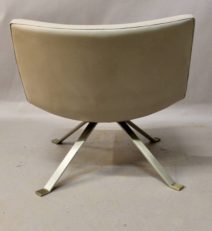 Design armchair with light grey skai top