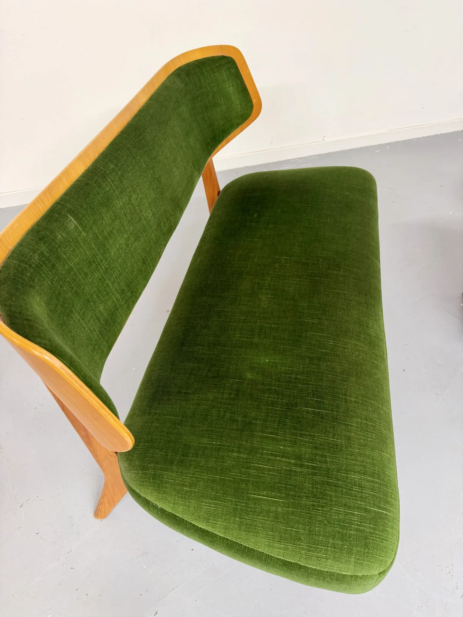 Sofa and armchair designed by Herta-Maria Witzemann, moulded wood, 1960s.