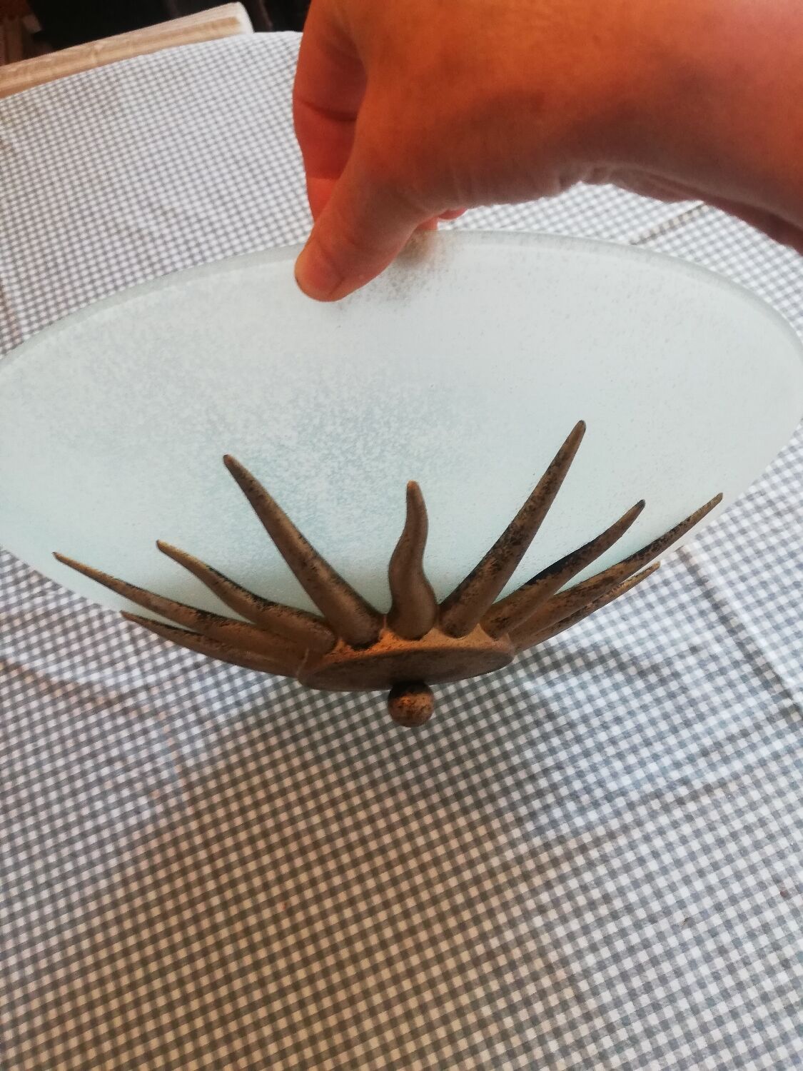 White opaque glass ceiling light and golden metal sun