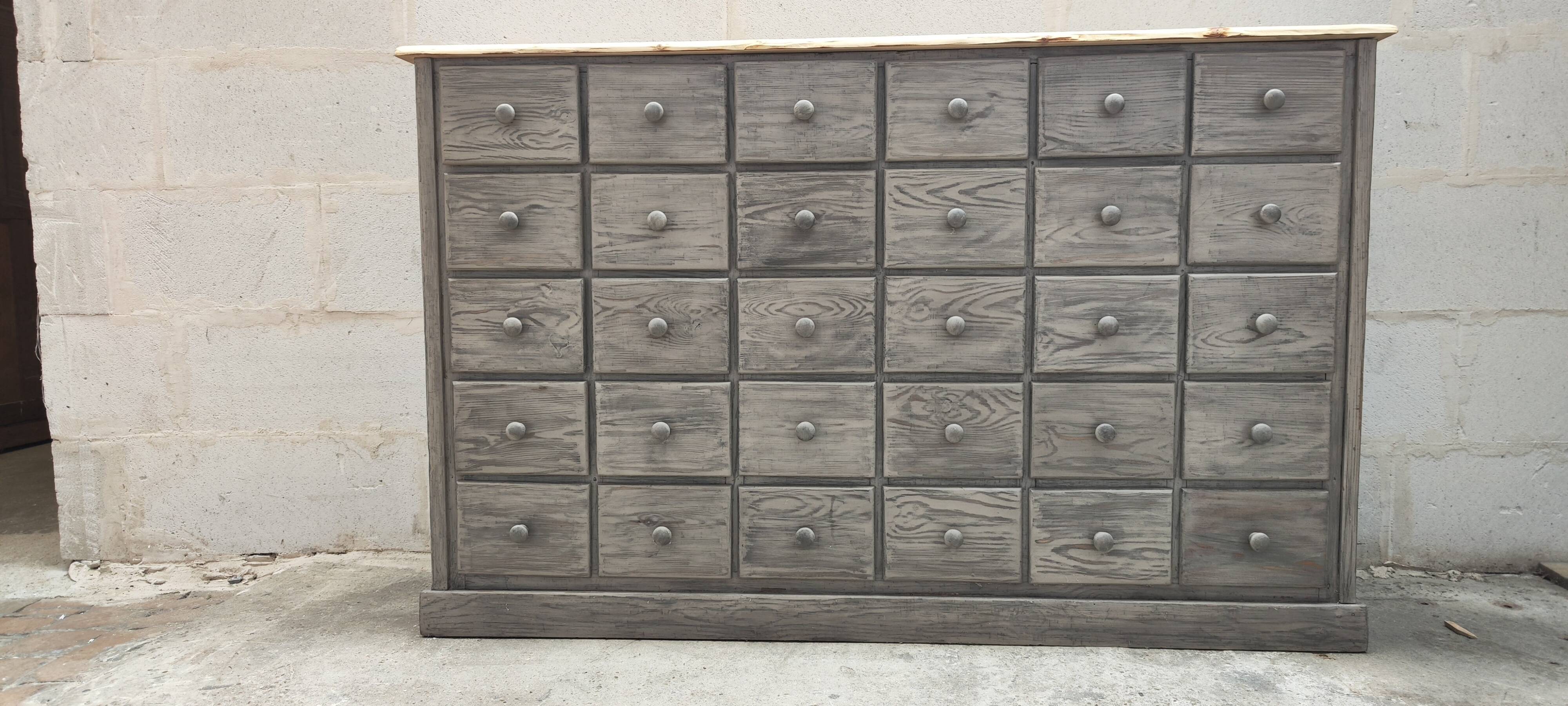 Old trade furniture with thirty drawers