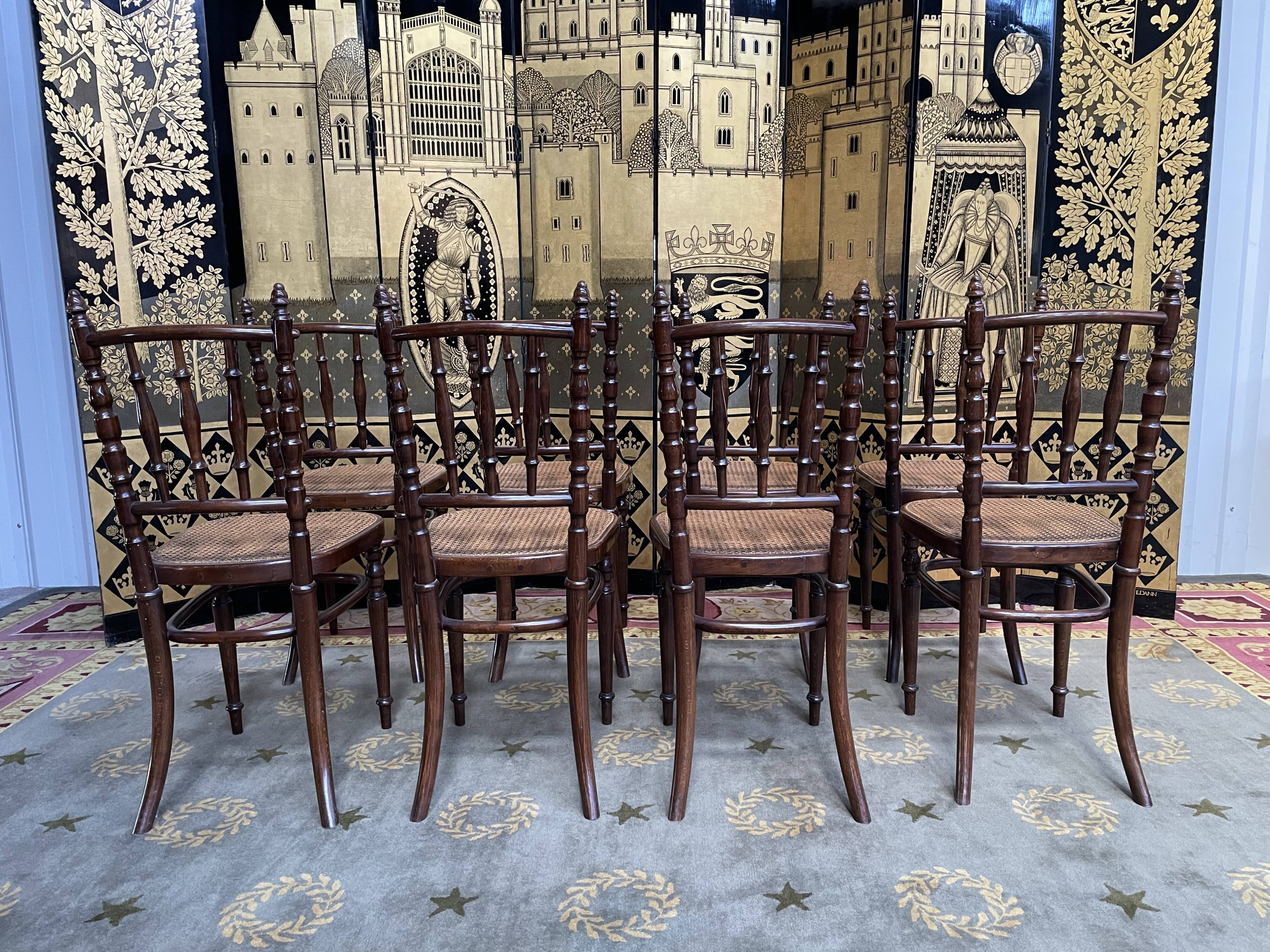 Suite of 8 bistro chairs in cannage FISCHEL