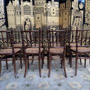 Suite of 8 bistro chairs in cannage FISCHEL