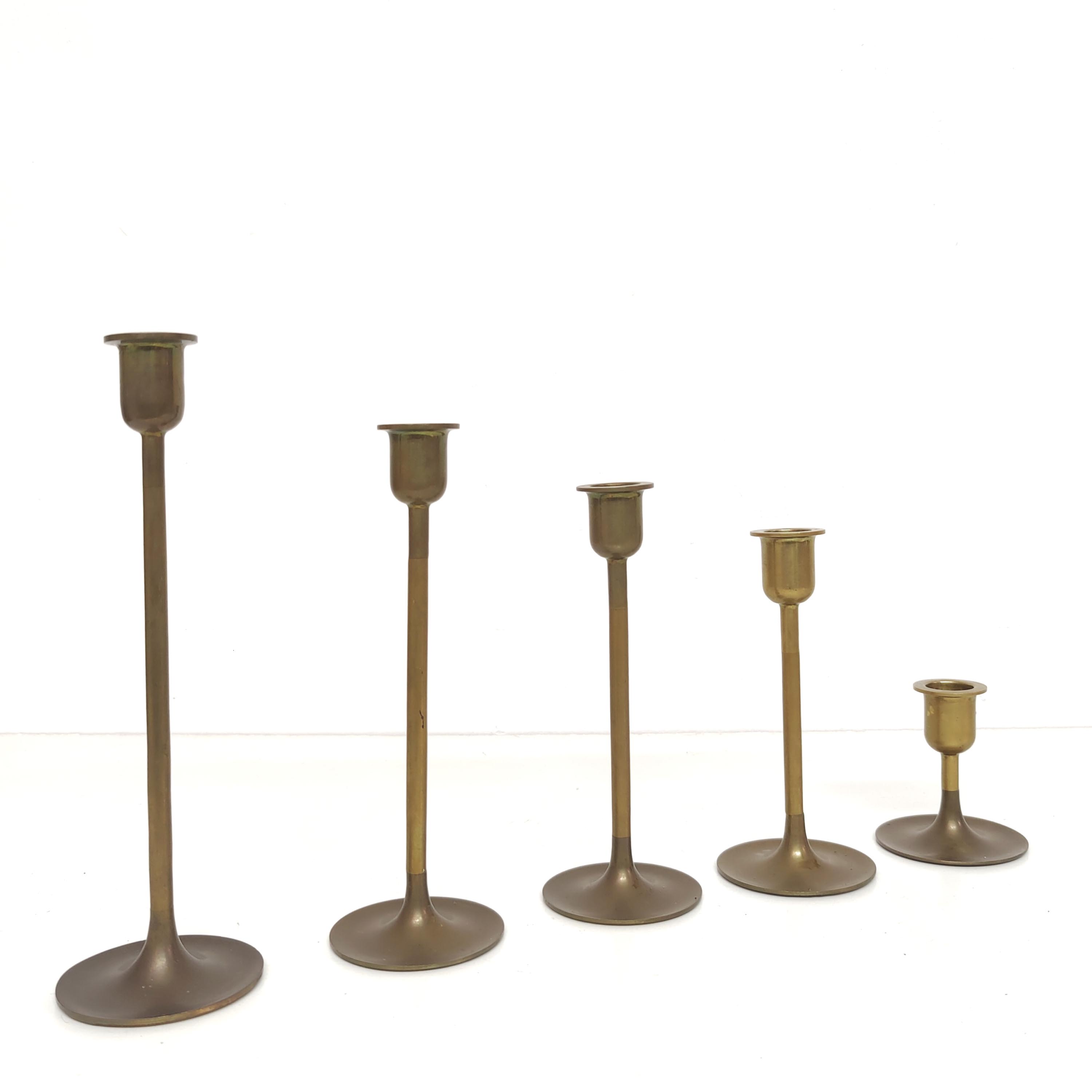 Set of 5 Scandinavian brass candlesticks 1960