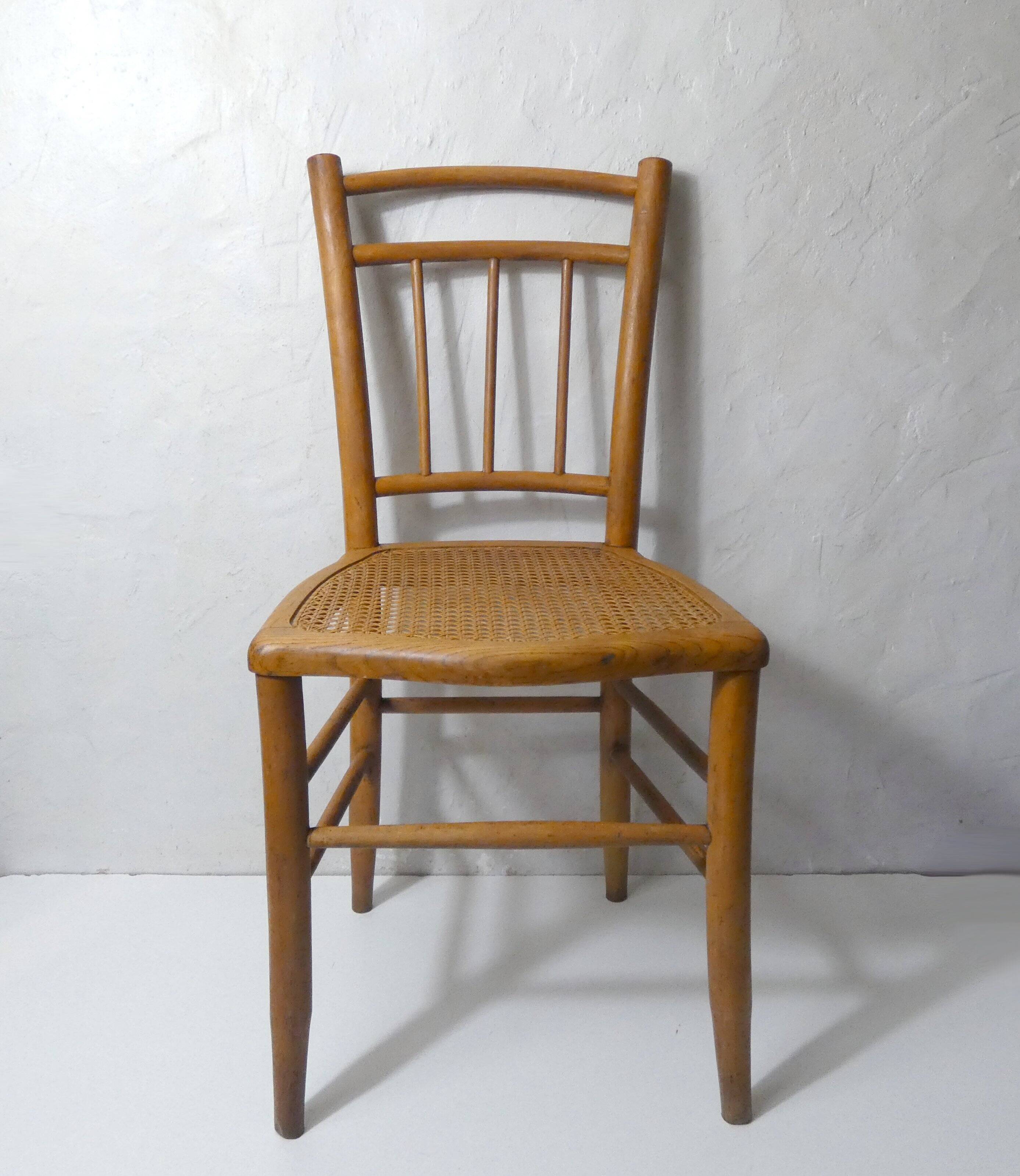 vintage wooden bistro chair with caning