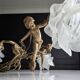 Vintage chandelier with cherubs and frosted glass flowers.