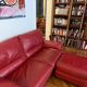 Set convertible leather sofa and footrest Natuzzi